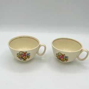 Set of 2- Cute tea/coffee cups. Cream with a floral embroidery design
